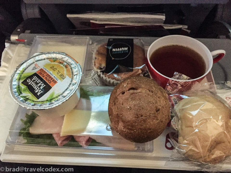 a tray of food and a cup of tea