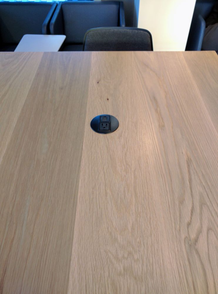 a table with a power outlet