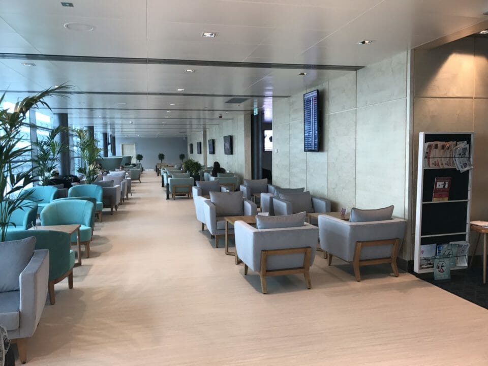 a room with chairs and tables