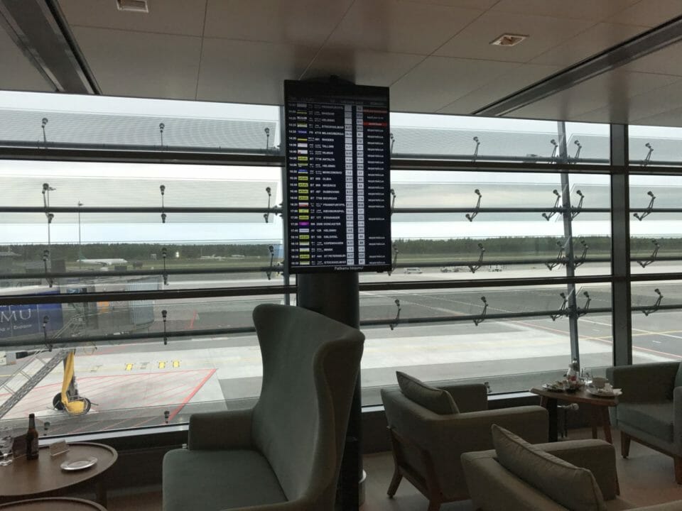 a room with a large window and a sign