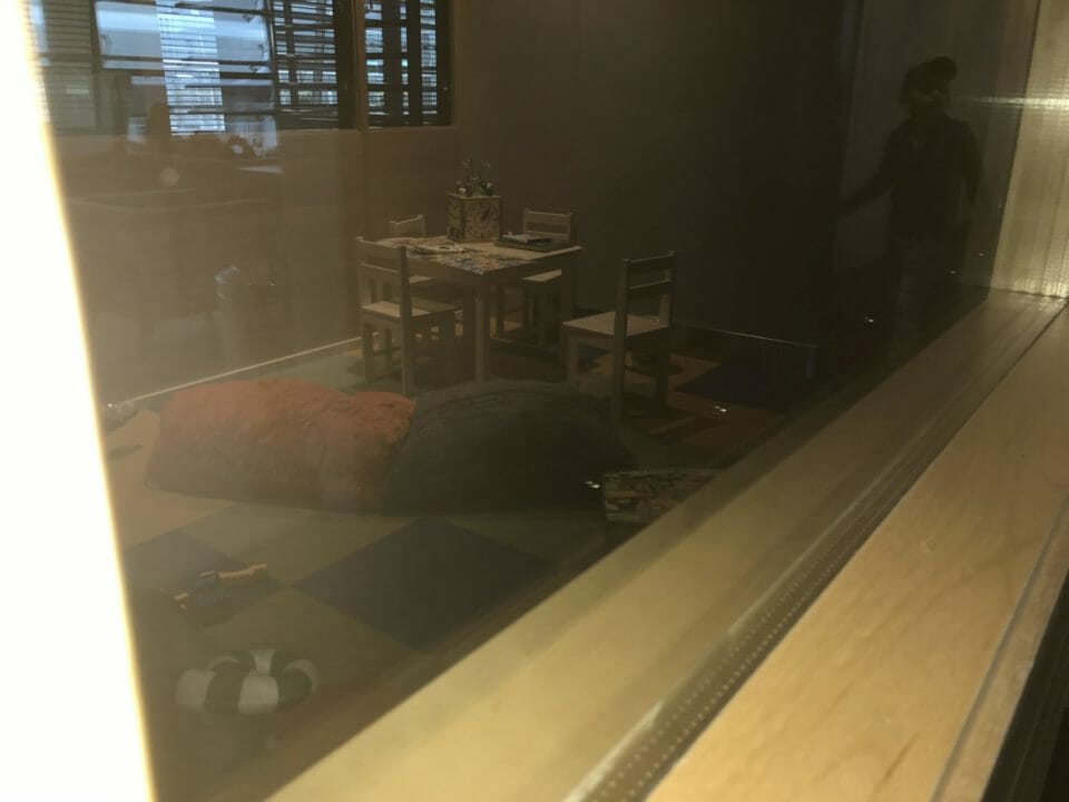 a room with a table and chairs