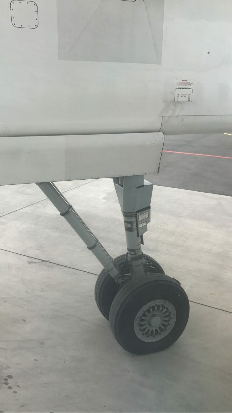 a close up of a plane's landing gear