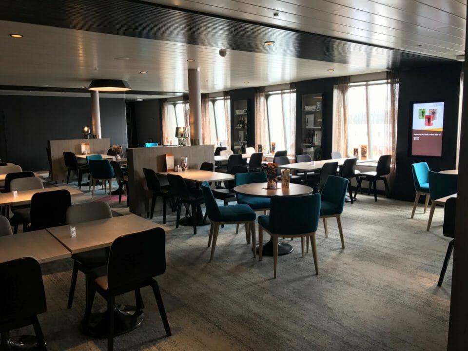 a room with tables and chairs