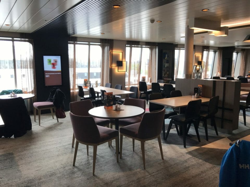 a room with tables and chairs