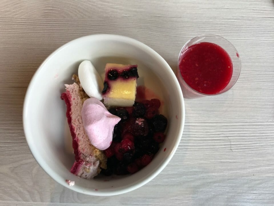 a bowl of food and a drink