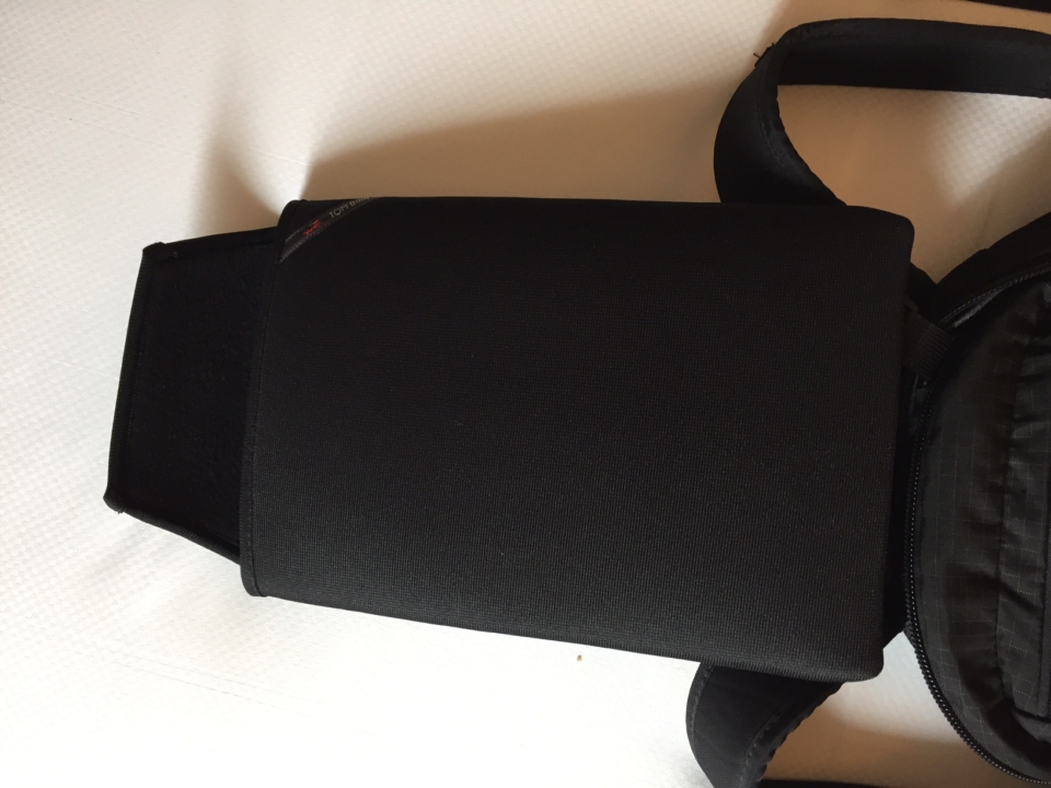 a black bag on a white surface