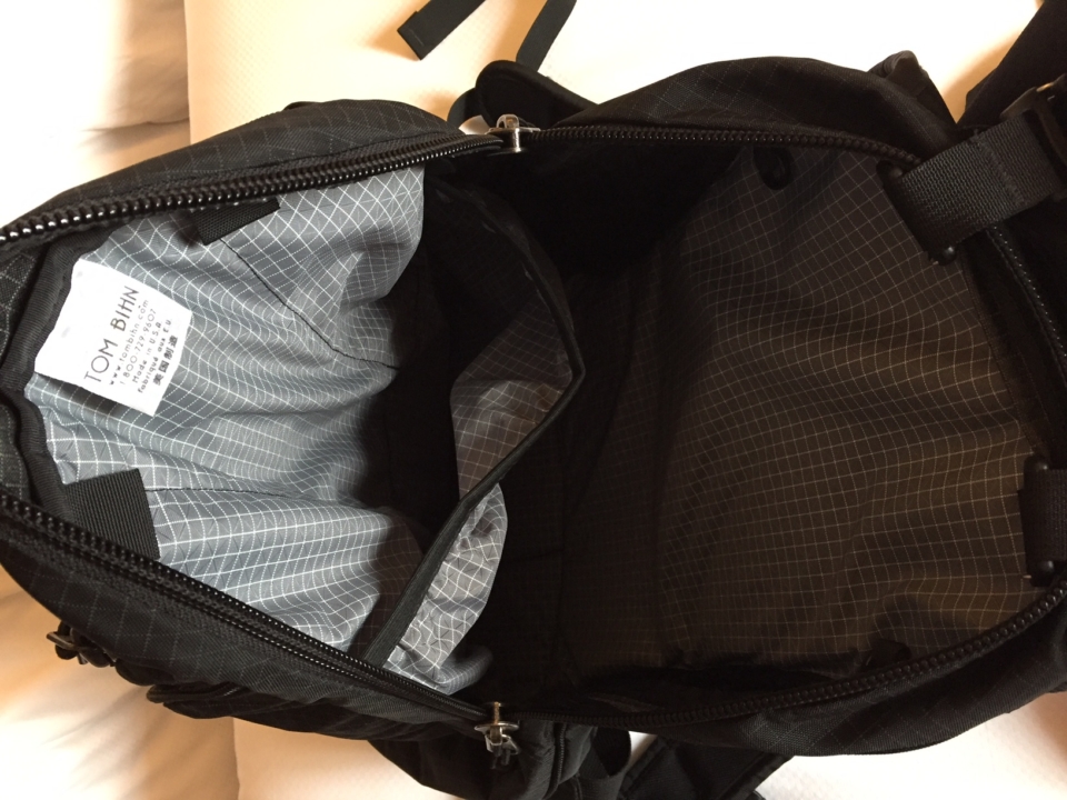a black bag with a white stripe inside