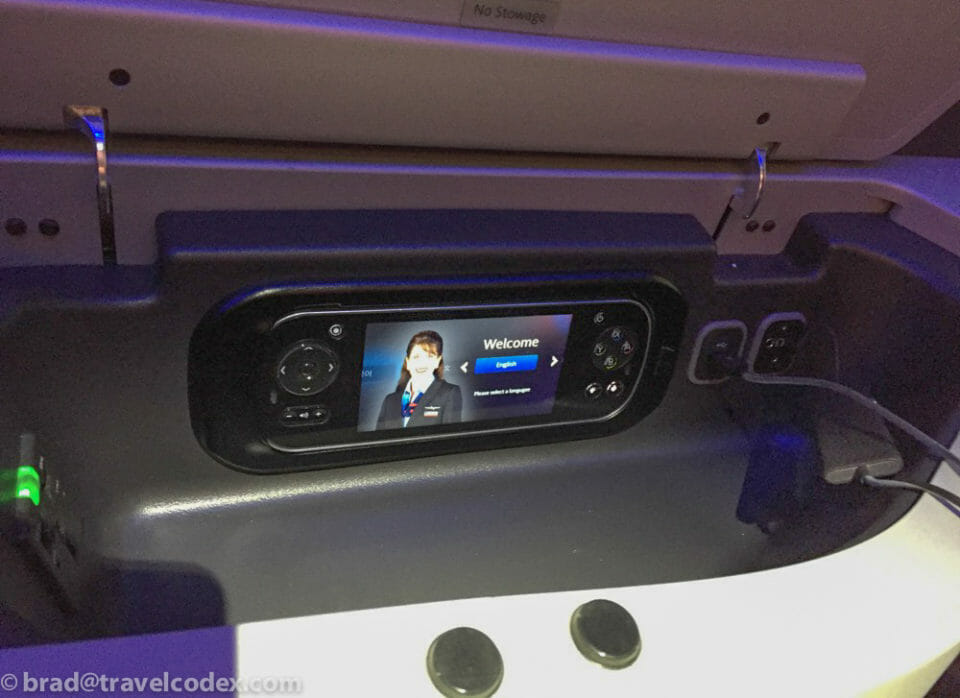 a screen on the side of a seat