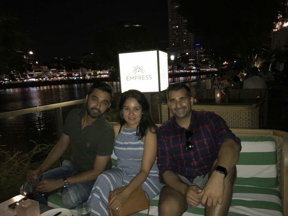 a group of people sitting on a bench