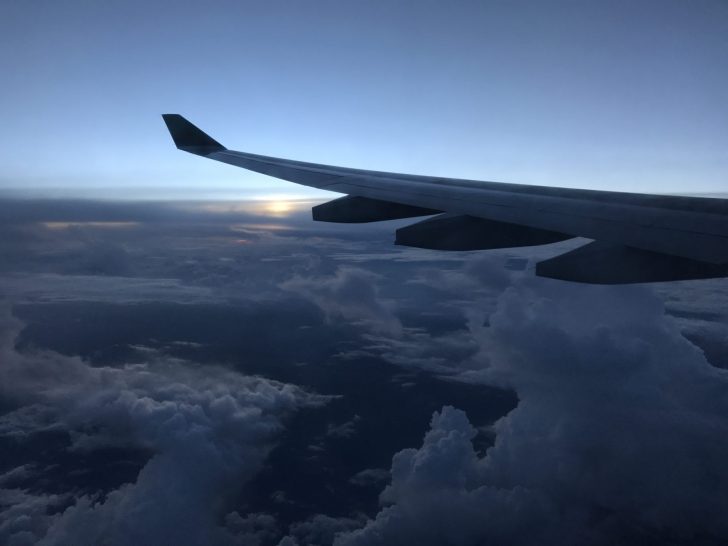 an airplane wing in the sky