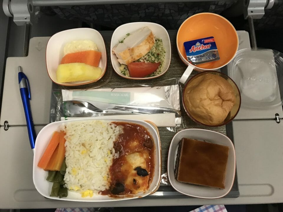 a tray of food on a plane