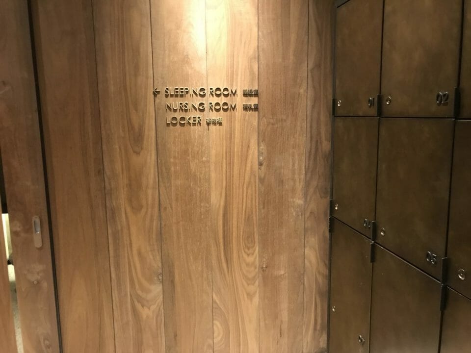 a wooden wall with a sign on it