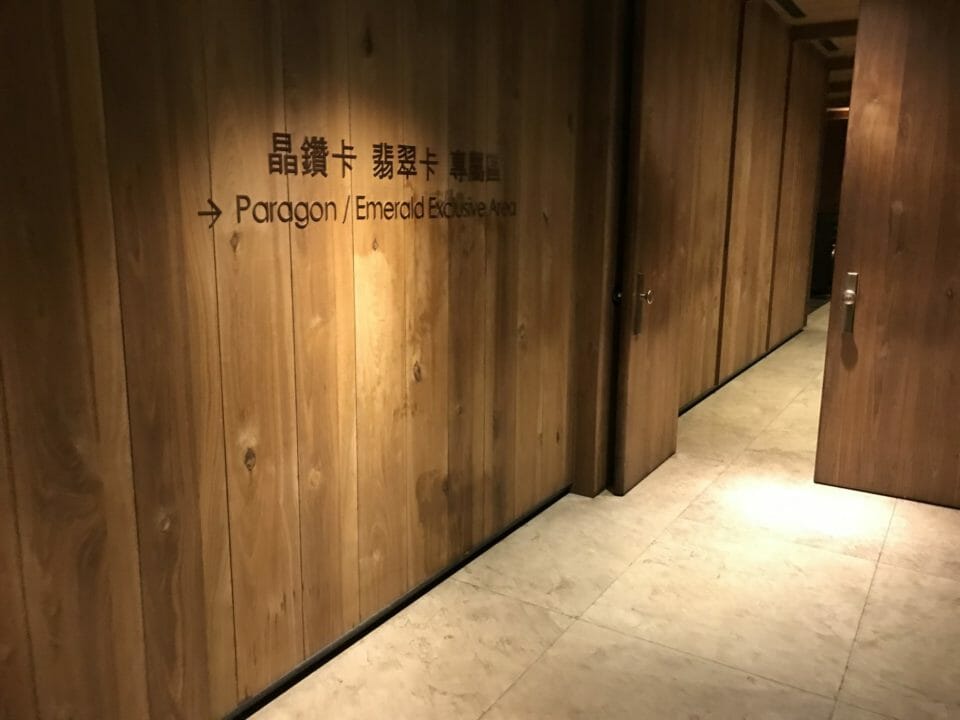 a wooden wall with writing on it