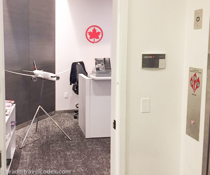 a plane on a stand in a room