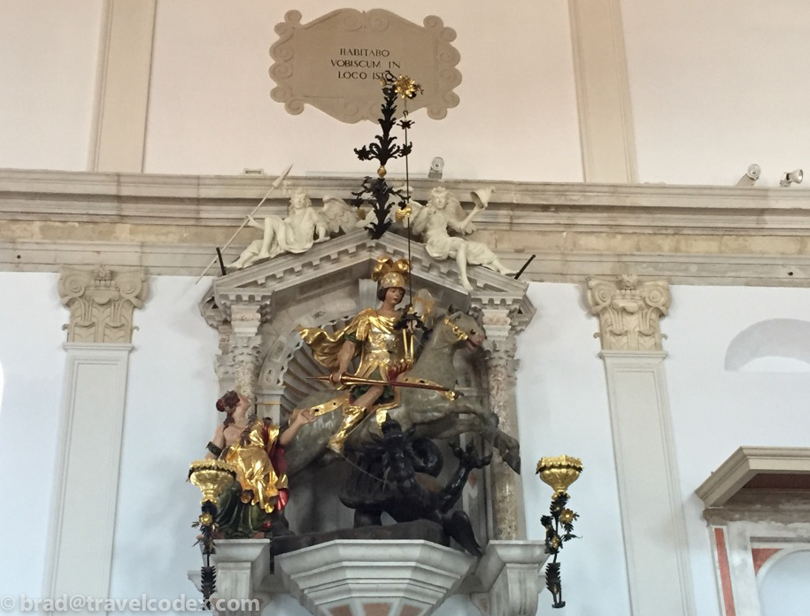 a statue of a man riding a horse