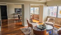 a room with a table and chairs