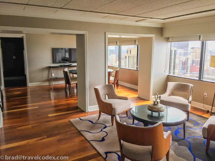 a room with a table and chairs