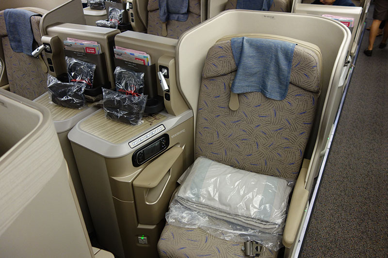 a seat with a towel and a towel on it