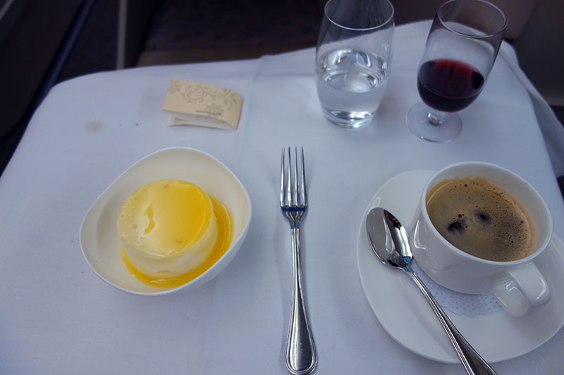 a plate of food and a fork on a table