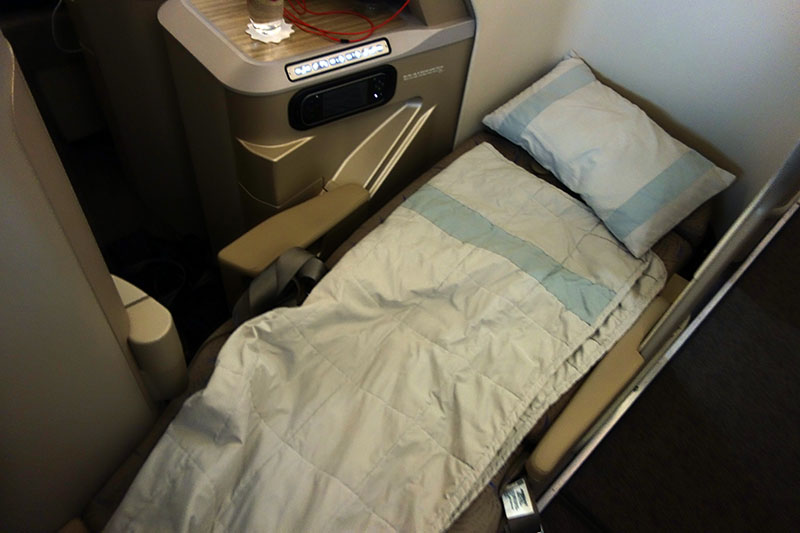 a bed in a plane