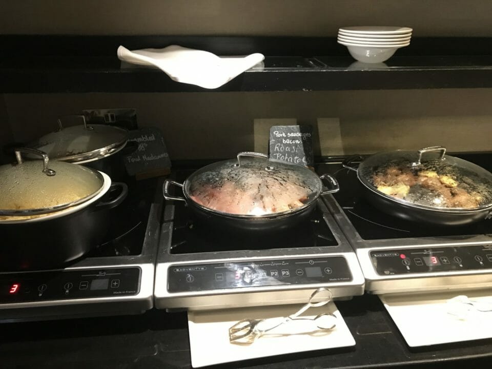 a group of pots on a stove