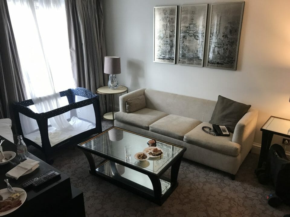 a living room with couch and coffee table