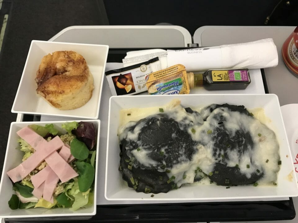 a tray of food on a plane