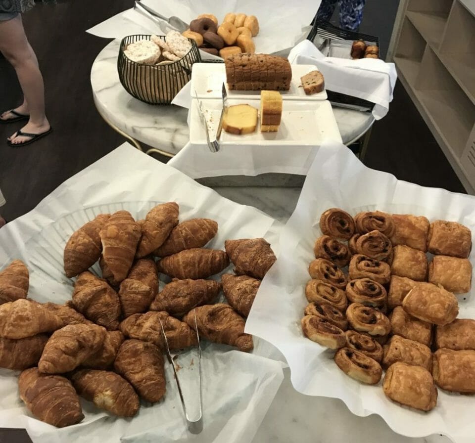 a table with pastries and bread
