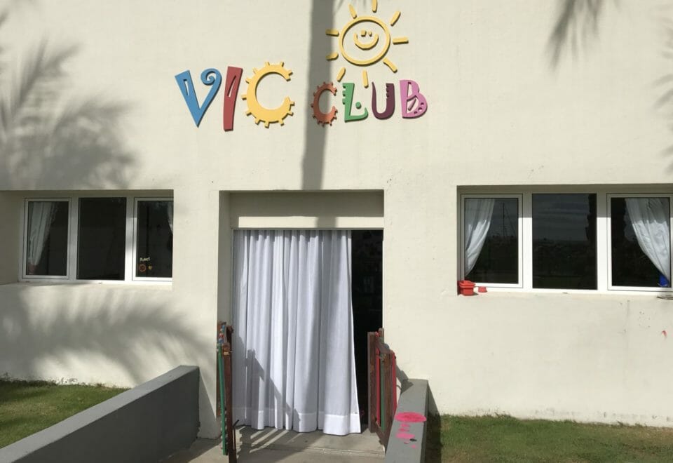 a white building with a sign on it