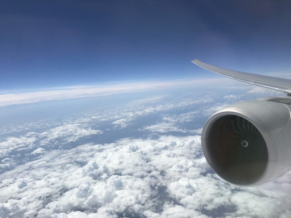 an airplane wing and the sky
