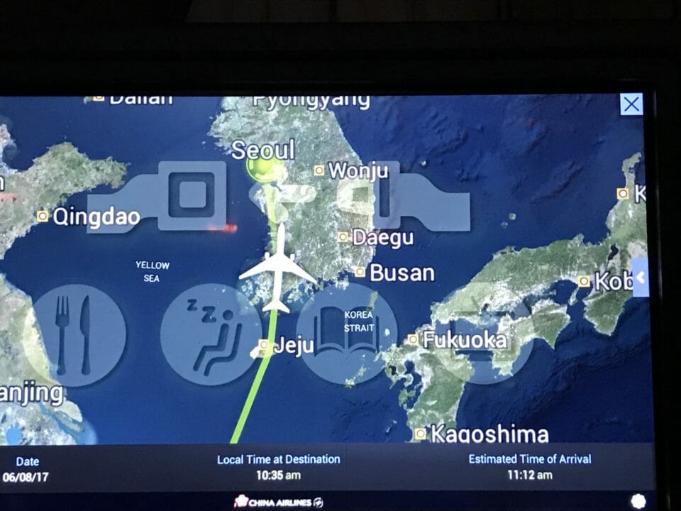 a map of the world with an airplane flying
