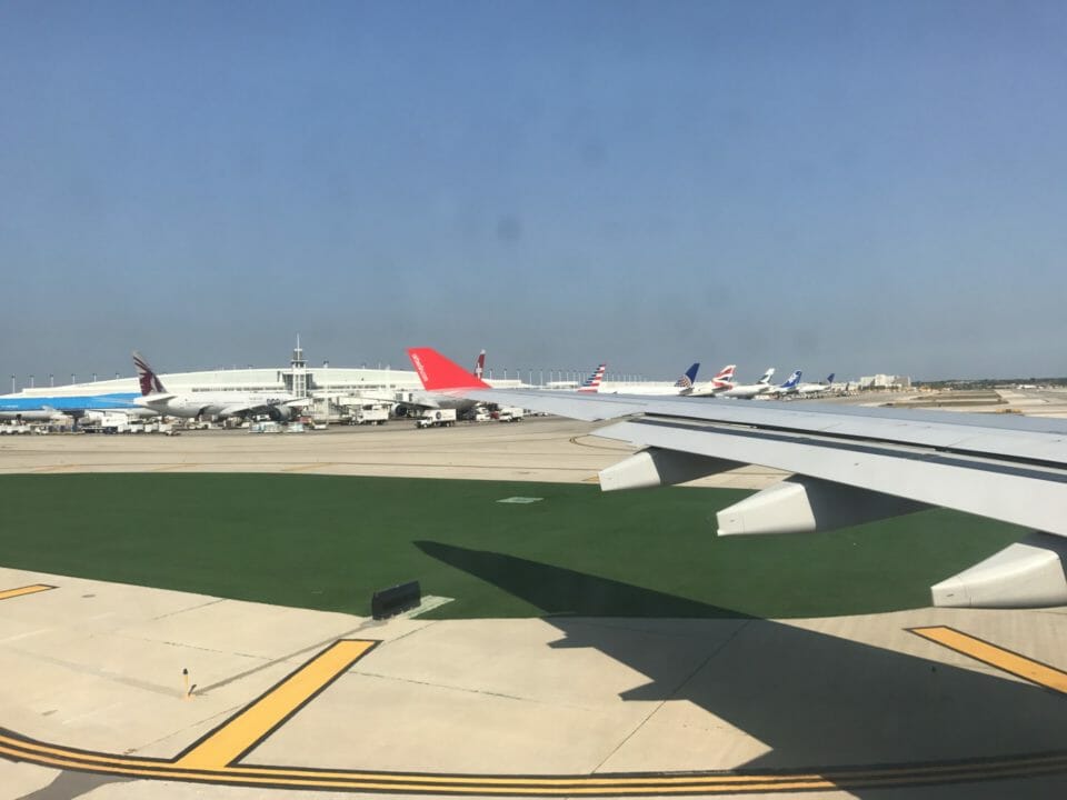 an airplane wing on a runway
