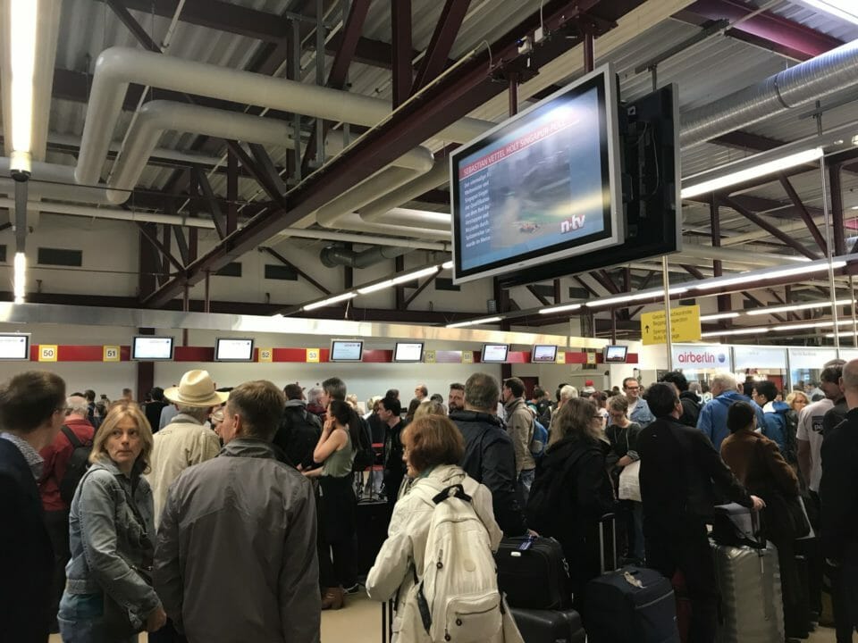 a group of people in a terminal