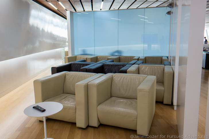 a group of leather couches in a room