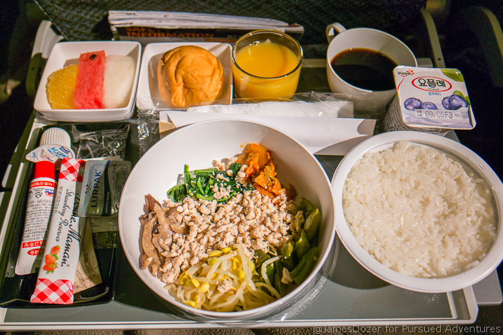 a tray with food and drinks on it