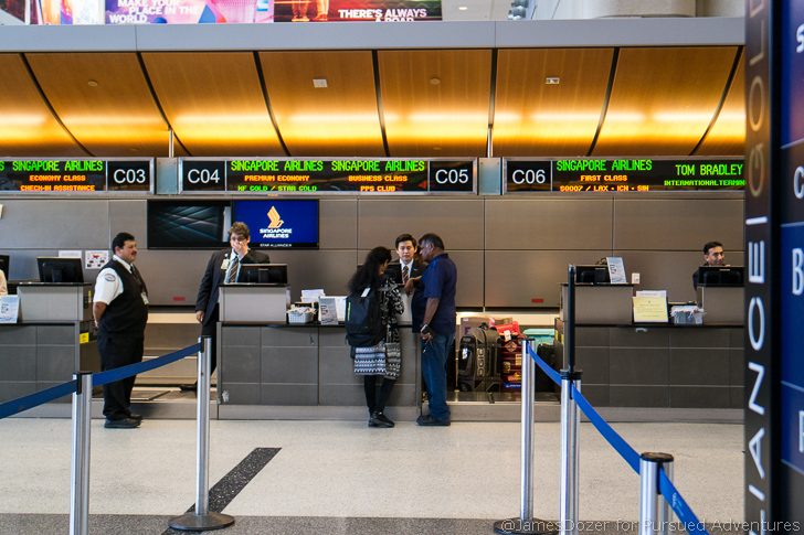 people standing in front of a counter
