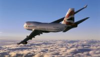 a plane flying above the clouds