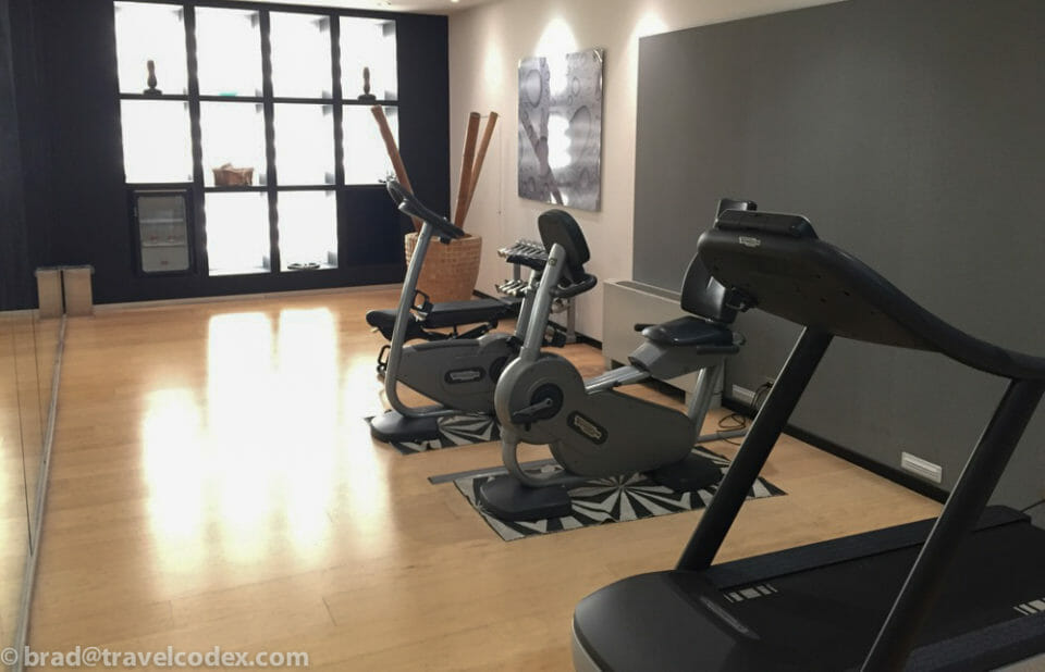 a room with exercise bikes and exercise equipment