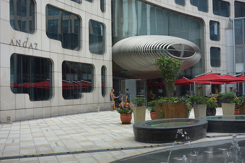 a building with a fountain and a fountain