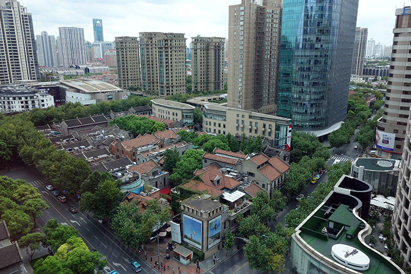 a city with many buildings and trees