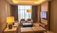 a room with a television and couches