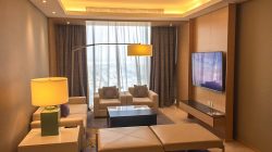 a room with a television and couches