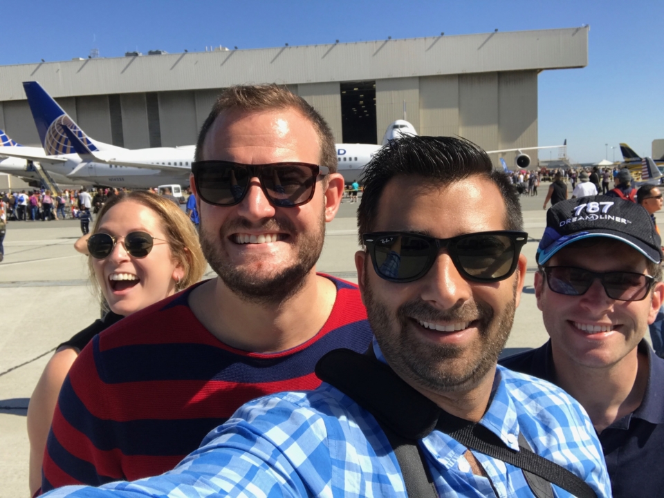 a group of people taking a selfie