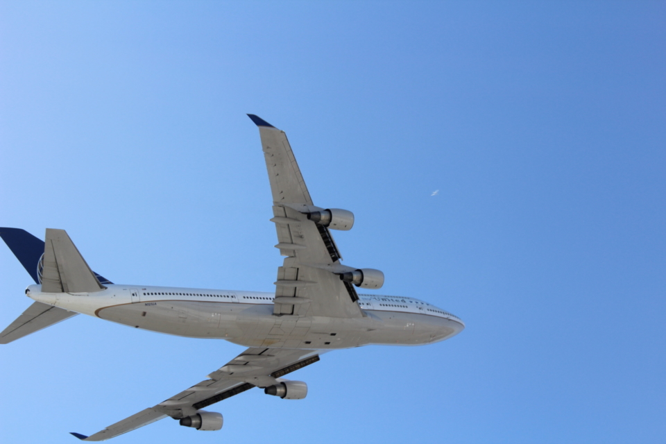 a plane flying in the sky