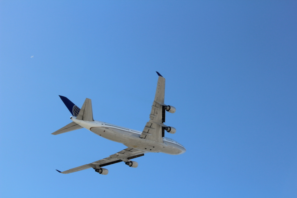 a plane flying in the sky