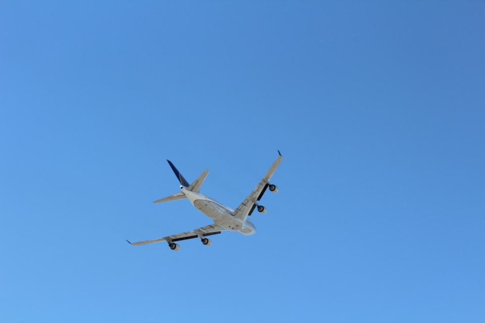 a plane flying in the sky