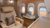 a laptop on a table in an airplane