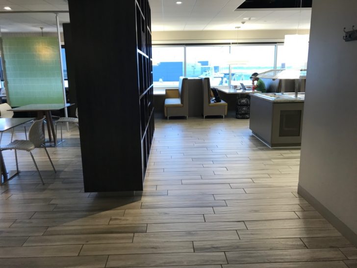 a room with a wood floor and a wood floor