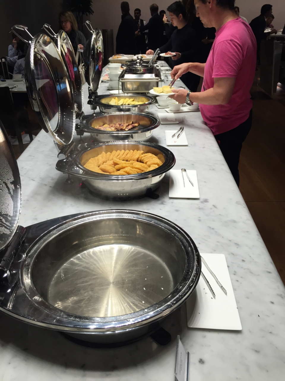 a buffet line of food