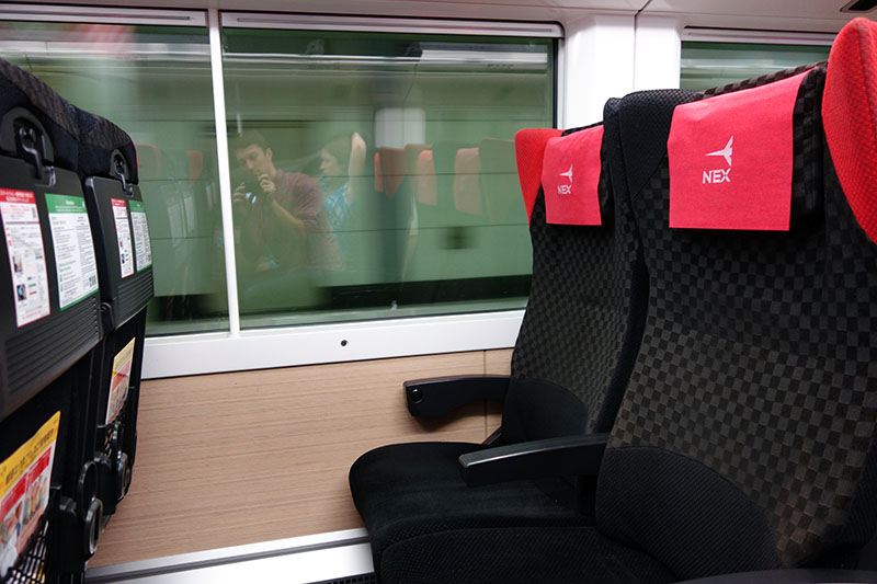 a seat with red cloths on it